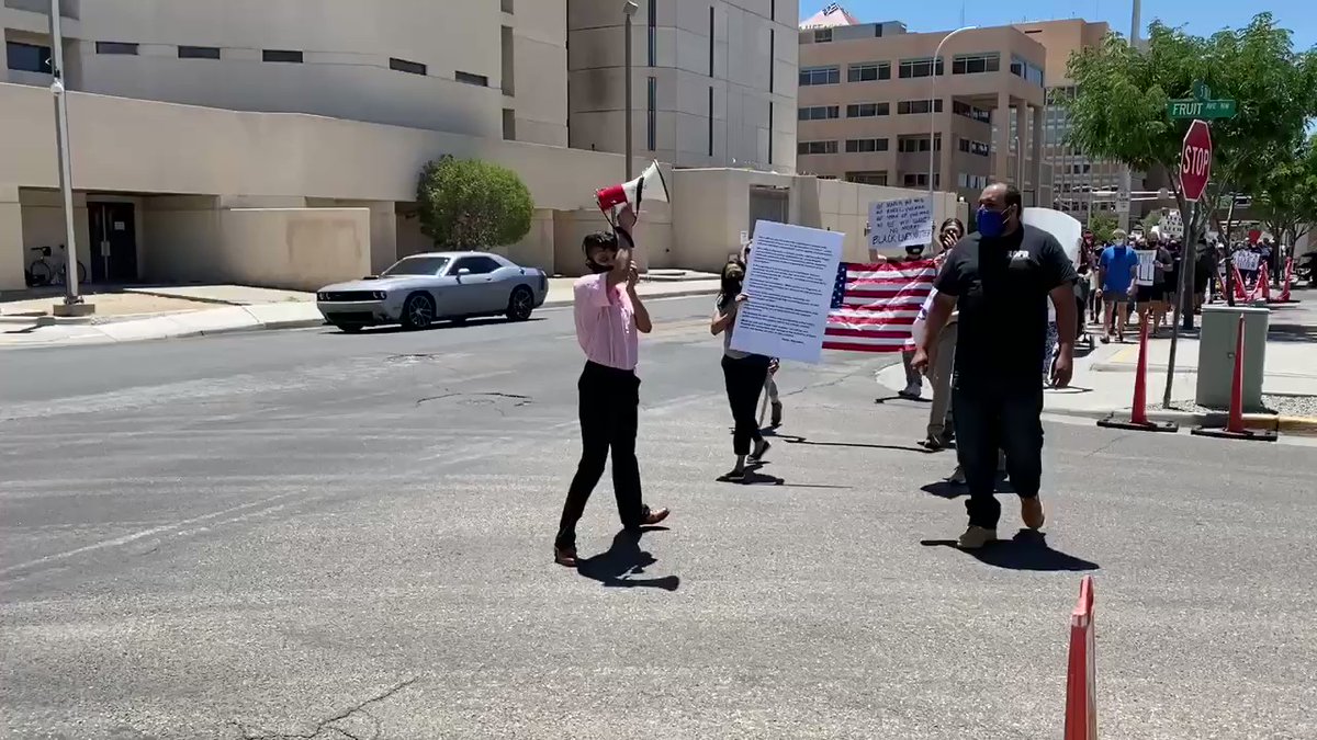 Albuquerque: a group of protestors including public defenders march against police brutality. 